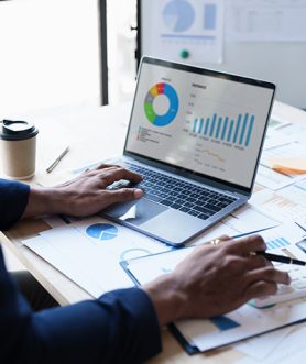 Close up Business man of financial analyze about company's graph profit. finance, strategy, meeting concept Close up Business man of financial analyze about company's graph profit. finance, strategy, meeting concept.